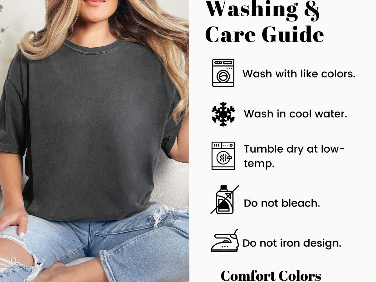 A woman wearing a dark charcoal gray Comfort Colors t-shirt is shown on the left, while the right side features a white panel titled 'Washing & Care Guide' with icons and text for washing, drying, bleaching, and ironing instructions.