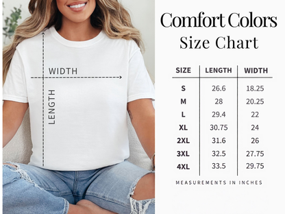 A size chart graphic for Comfort Colors t-shirts, featuring a woman wearing a white t-shirt with dashed measurement lines indicating width and length, alongside a size table listing measurements from S to 4XL in inches.