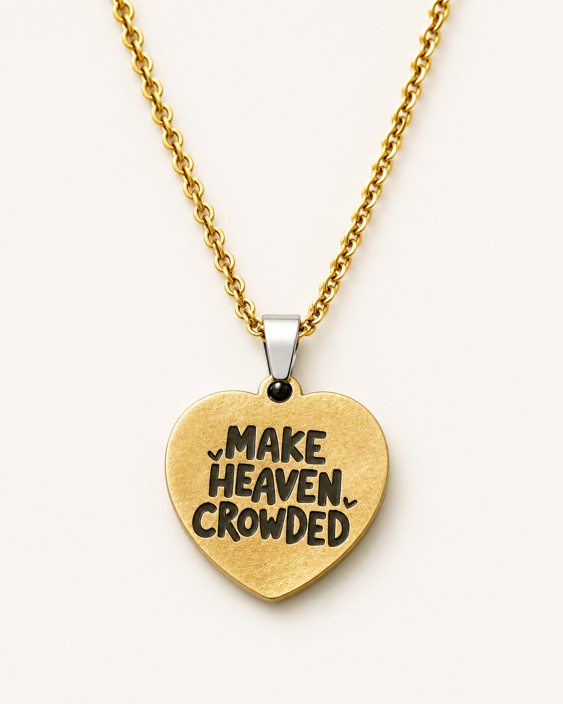 Gold heart-shaped Christian necklace engraved with the inspirational phrase "Make Heaven Crowded" on a polished pendant with a delicate chain.