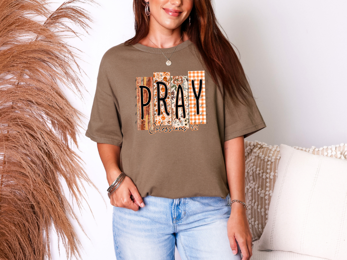 Brown Christian graphic tee with fall patterned PRAY design and Colossians 4:2 scripture