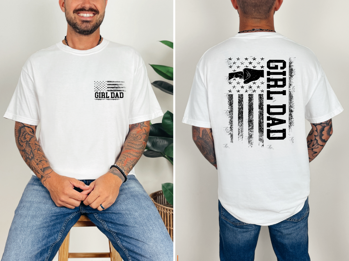 White Girl Dad graphic tee with distressed American flag pocket design featuring bows and bold black lettering.