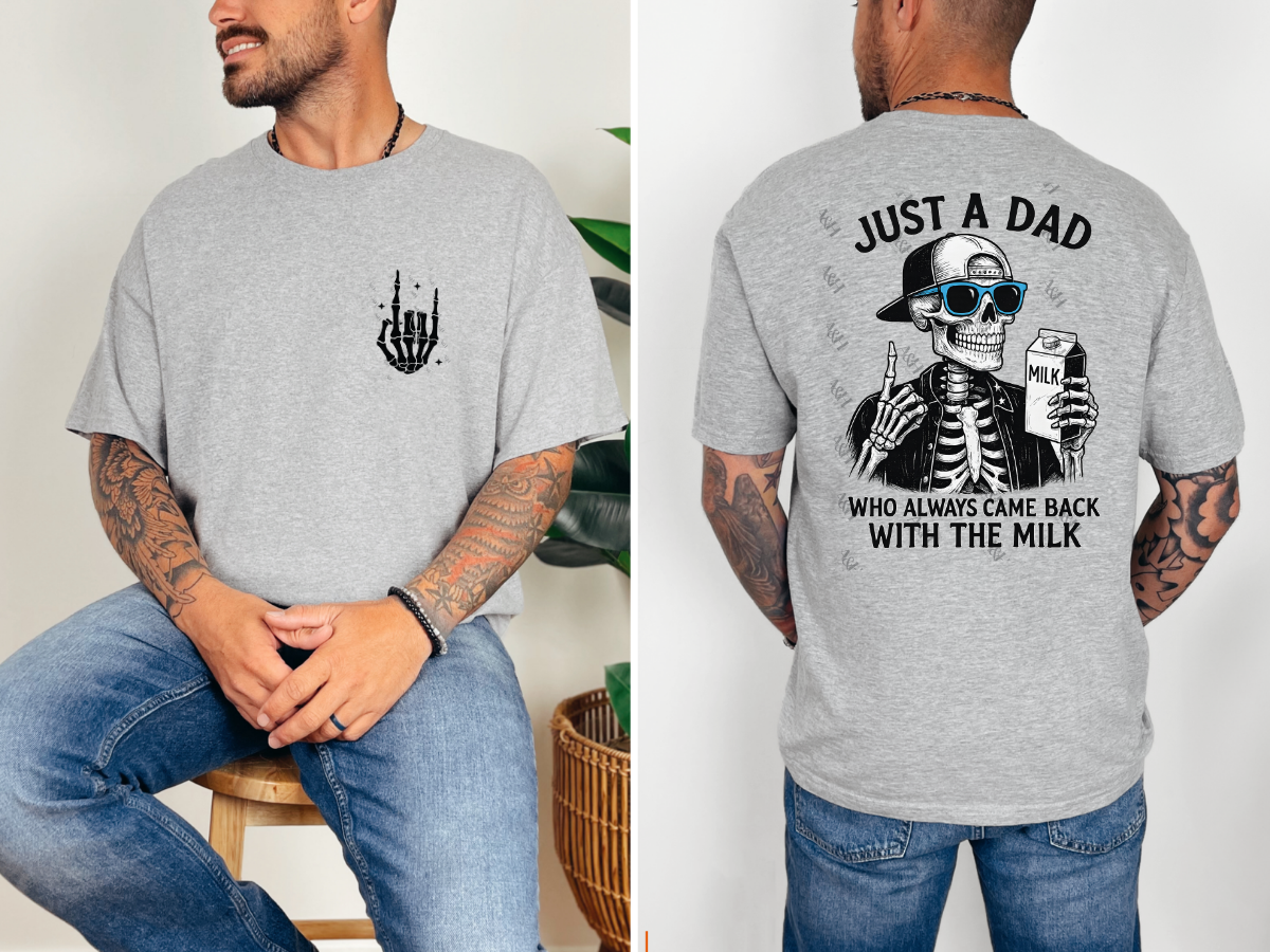 Grey graphic tee featuring a skeleton holding a milk carton with the phrase "Just a Dad Who Always Came Back with the Milk."